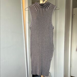 Women’s long sleeveless mock neck sweater